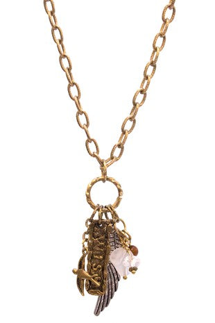 Wish charm worn gold necklace