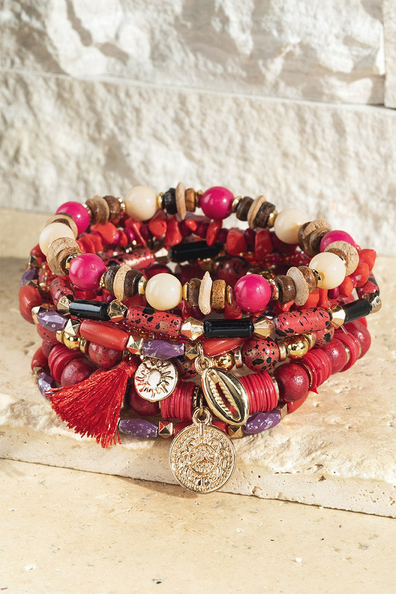Fire seed bracelet with charm accents *