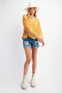 Floral printed blouse top: marigold