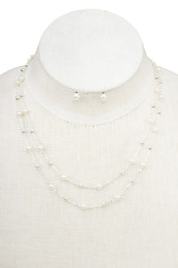 Layered pearl pendant necklace *