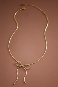 18k Gold bow pendant necklace