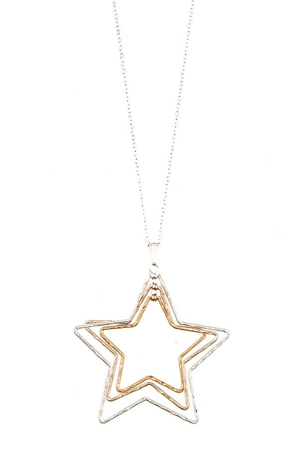 Worn silver, gold and rose gold star necklace