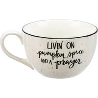 Living on Pumpkin Spice and a prayer" ceramic mug