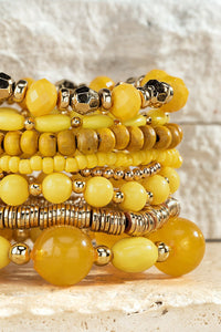 Daffodil Seed Bead bracelet with charm accents