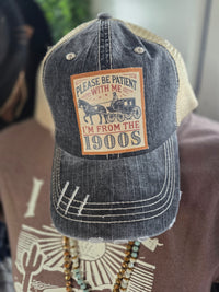 "PLEASE BE PATIENT WITH ME" DISTRESSED TRUCKER HAT  BLACK/ KHAKI