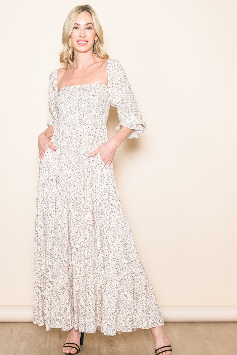 Sassafras Dress with smocked bodice floral details in cream
