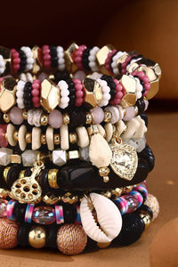 8-Strand Stretch Bracelet with Cowrie Shell Charms