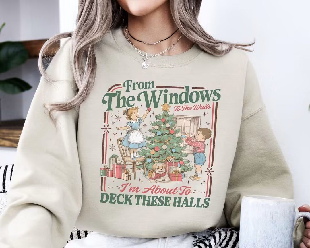 DECK THESE WALLS HOLIDAY GRAPHIC SWEATSHIRT