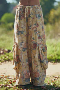 FLOWER PRINTED DENIM WAIST DROPPED POCKETS PANT: Yellow