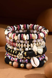 8-Strand Stretch Bracelet with Cowrie Shell Charms